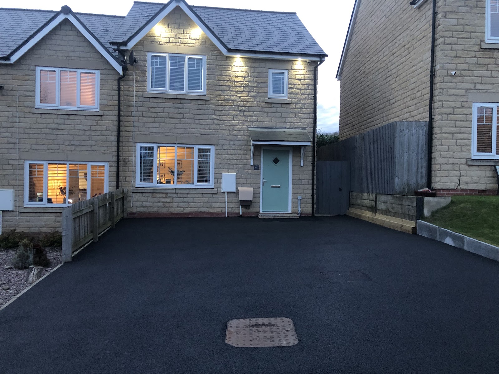 Completed groundwork — drains, stonework and lawn — in Blackburn